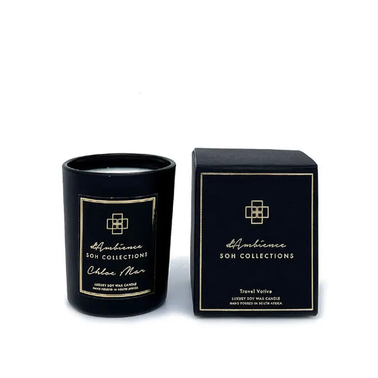 Chloe Mar Travel Votive with black candles in matching boxes and gold labels for diffuser ambiance