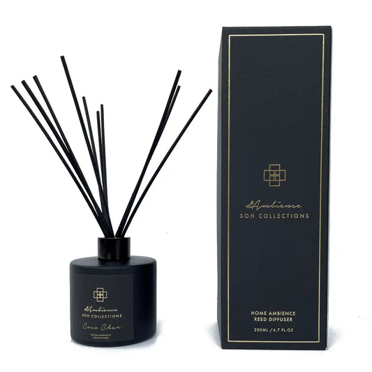 Black reed diffuser with matching box for Coco Char Reed Diffuser featuring black rattan design