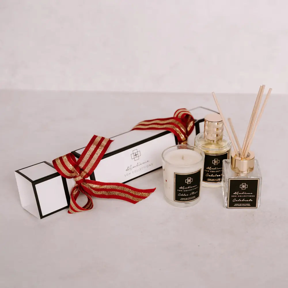 Festive Christmas cracker gift set with home fragrances including candle and reed diffuser