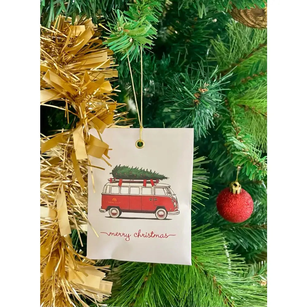 White gift tag with red vintage van and Christmas tree for festive season diffuser