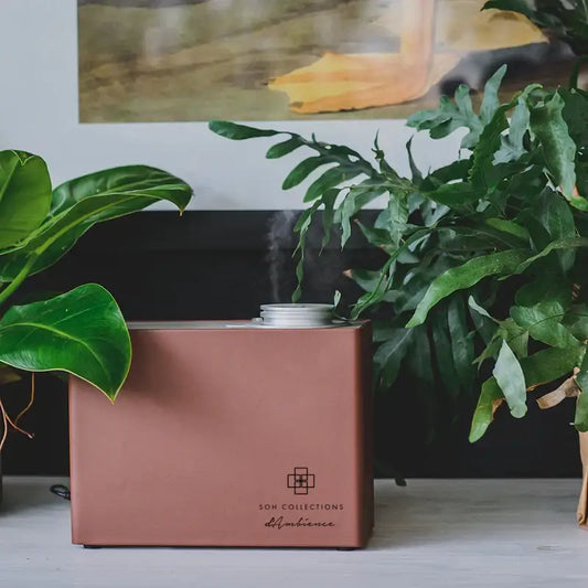 Rose gold scent diffuser emitting mist for Scenting Unit Installation setup