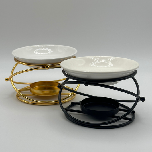 Ceramic-topped metal wax melt burner in gold and matte black home fragrance style